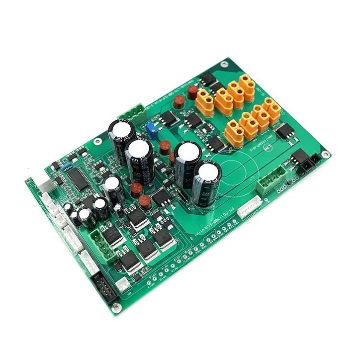 Assembled circuit board with through-hole electrolytic capacitors and terminal blocks